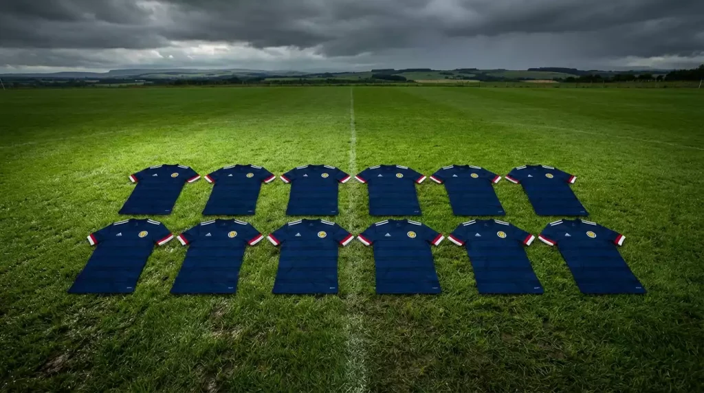 Scotland national team players in dark blue jerseys preparing for World Cup 2026 campaign